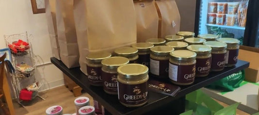 Gheedy-Up caramelized ghee jars on display at Juniper Creek in High River — locally made ghee in Alberta, crafted in Calgary with Canadian butter.